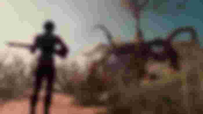Nightingale player holding gun with monster in background