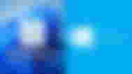 windows 11 next to windows 10 logo and color