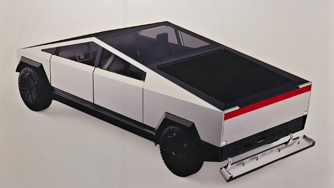 A Tesla Cybertruck-shaped Mini PC with the bumper off and showing ports