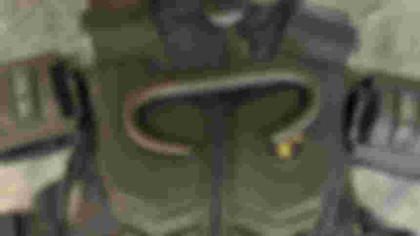 bHaptics TactSuit X40, TactVisor, and Tactosy for Arms laid out on a marble countertop