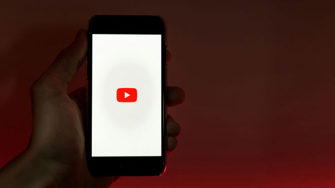 YouTube logo on smartphone.