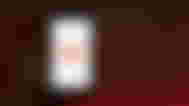 YouTube logo on smartphone.