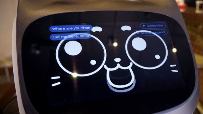 Human Waiter made to compete against Cute Robot Cat in café dystopia 