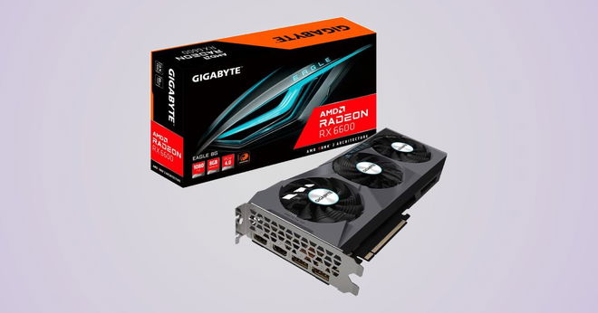 A black box with red and orange trim behind a grey graphics card featuring three black fans.
