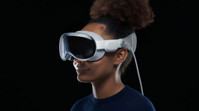 A woman wearing an Apple Vision Pro headset in front of a black background.