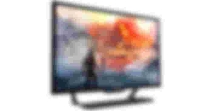 Acer Predator CG437K product image of a black monitor with a video game character looking up towards an erupting volcano on the display.