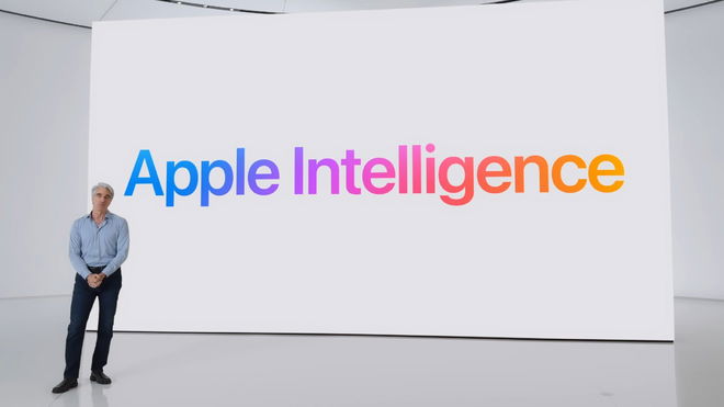 Craig Federighi, Senior Vice President of Software Engineering standing in front of an Apple Intelligence presentation at WWDC 2024