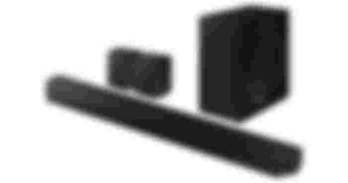 Samsung HW-Q990D product image of a black soundbar with two speakers and a subwoofer behind it.