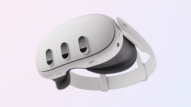 A white Meta Quest 3 headset in front of a bluey-gray-like gradient background from Meta