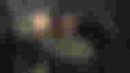 Pawn holding her hand up and revealing the Nexus Mods logo in Dragon's Dogma 2