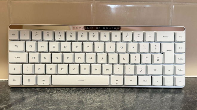 ASUS ROG Falchion RX Low Profile in front of a tiled wall