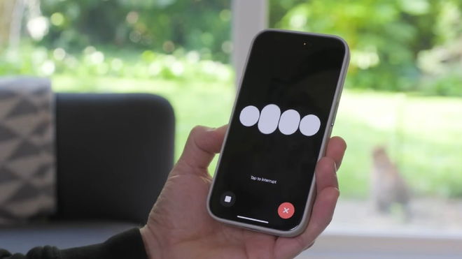 A person holding a smartphone with the ChatGPT 4o voice assistant activated and ready to listen