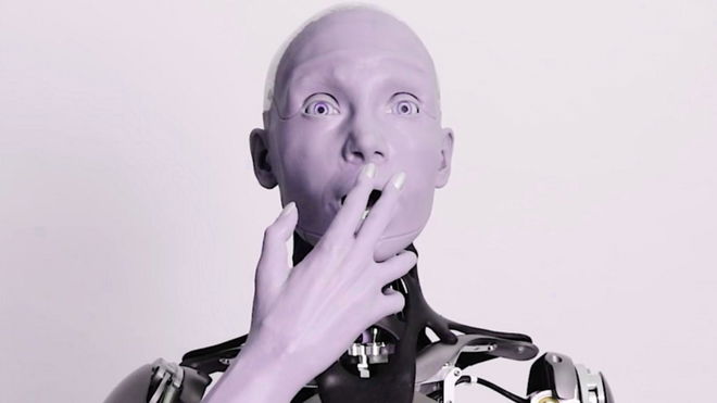 humanoid-robot-helpers-6-billion an Ameca robot looking shocked 