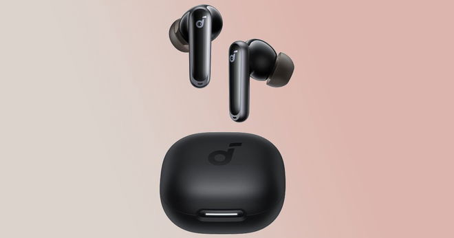 A black pair of wireless earbuds above a charging case in front of a gradient bronze background.