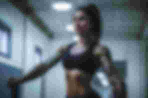 best-fitness-apps-for-women | Sweat | A woman in gym