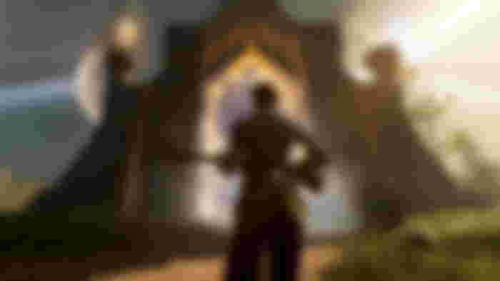 nightingale character with gun walking up to realm portal