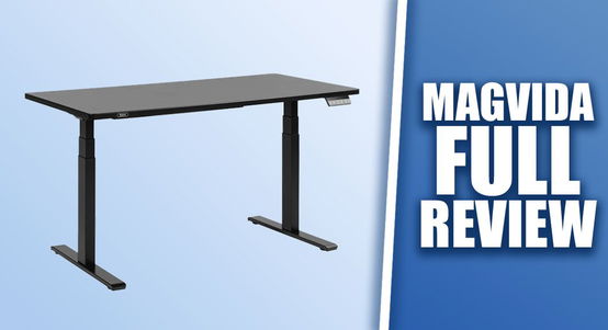A black standing desk on one side of a white line. On the other, "MAGVIDA FULL REVIEW" in white with a dark blue glow around it.