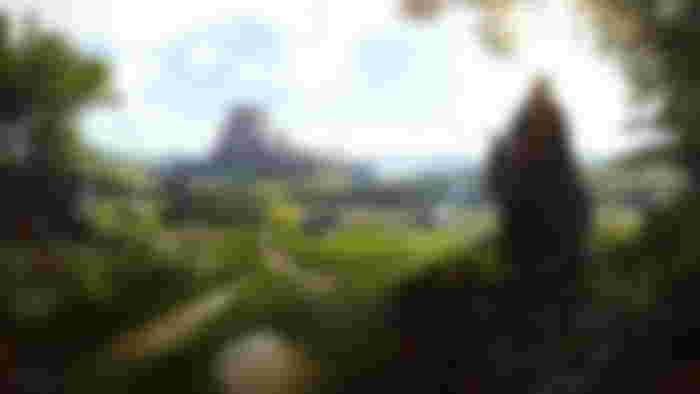 Manor Lords player riding horse and overseeing land