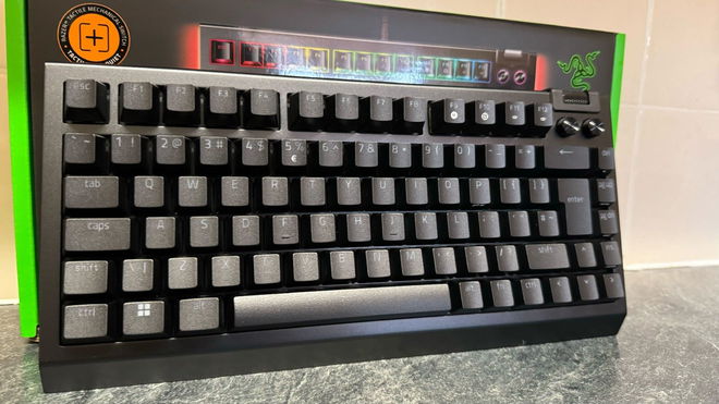 Razer Blackwidow V4 75% in front of a tiled wall