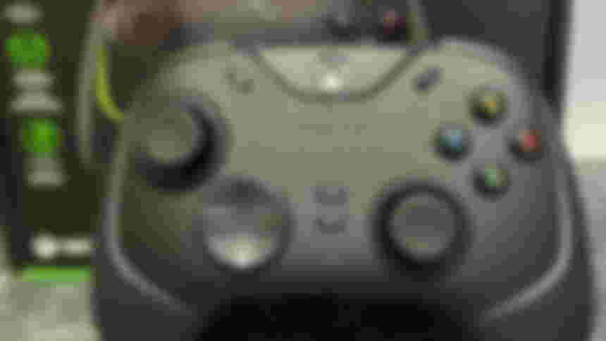 Razer Wolverine V2 Chroma Xbox controller in front of the box