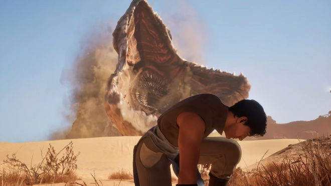 Dune Awakening player standing in front of monster in background