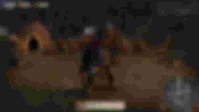 A zoomed in image of gameplay from Warhammer Realms of Ruin, showing a closeup of an Ork unit