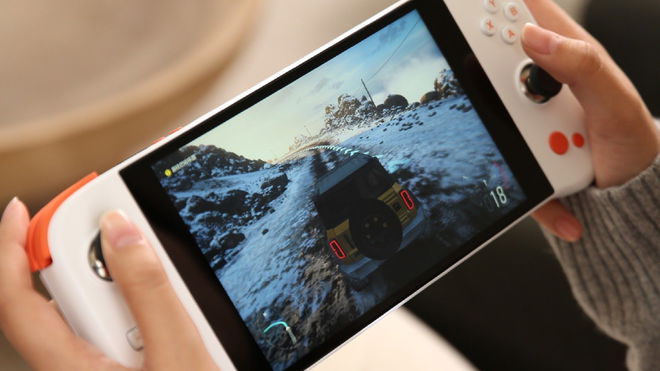Someone playing Forza on an AYANEO Next Lite handheld