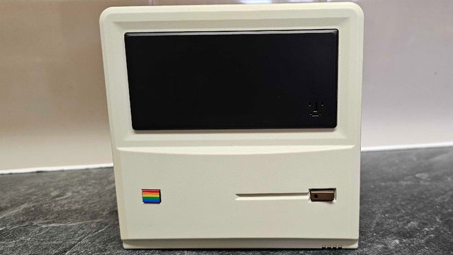 AYANEO Retro Mini PC AM01 standing on a marble countertop