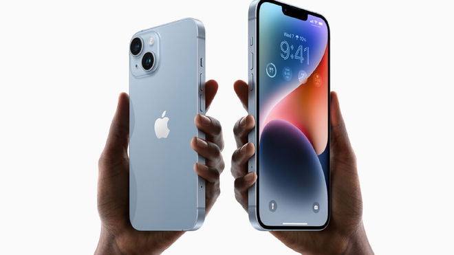 Two hands holding up the iPhone 14 and Plus models in press image