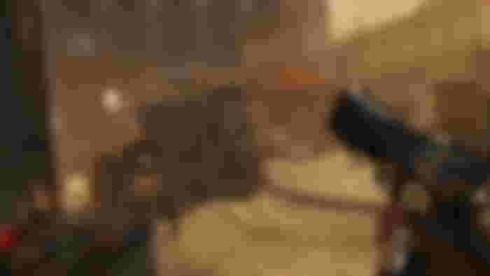 Reloading your gun as an enemy prepares to shoot at you in Half-Life: Alyx - best Oculus games
