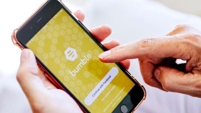 Bumble likes reset time - An image of the Bumble app on a phone