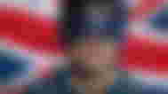British people Metaverse; the guy from ready player one on a British flag