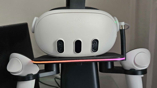 Quest 3 headset sitting on the KIWI Design RGB Vertical Stand
