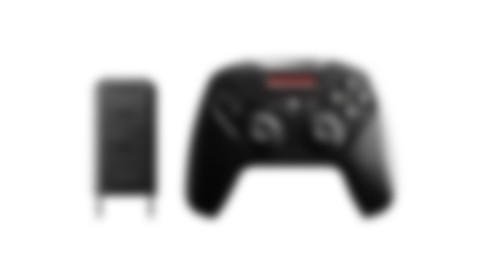 SteelSeries Nimbus+ product image of a black controller featuring orange lights.